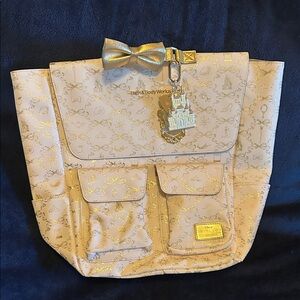Bath & Body Works Cream Princess Backpack with gold accents and charms. NWOT